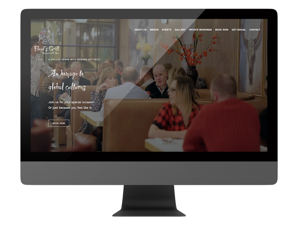 Floyd's Grill webpage on a mac screen